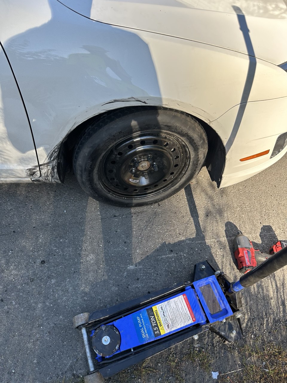 Spare tire installed roadside